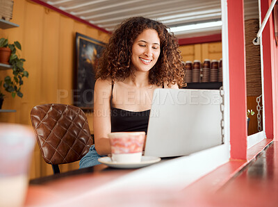 Buy stock photo Happy, carefree and excited freelance woman working in a coffee shop doing remote work. Young student learning typing a project in a cafe in a student town using a laptop and free wifi