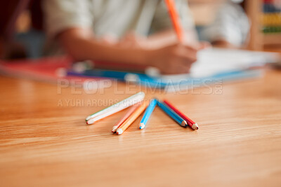 Buy stock photo Pencils, crayons and pens on a table for creative drawing, artwork and art education in a classroom at school. Coloring supplies, equipment and tools for creativity, artist students on a desk