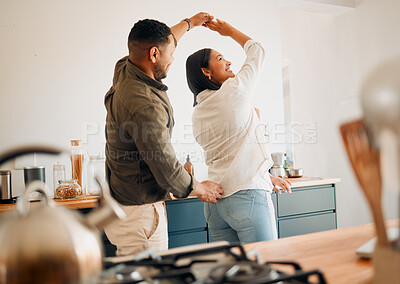 Buy stock photo Dancing, romance and playful couple having fun, love and bonding while laughing, spinning and twirling together at home. Loving husband enjoying care, affection and joy while relaxing with happy wife