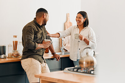 Buy stock photo Playful, coffee and loving couple bonding and having fun together in the kitchen at home. Smiling, in love and carefree couple laughing and sharing a romantic moment while enjoying the weekend.