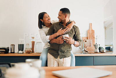 Buy stock photo Happy, hugging and romantic couple bonding and feeling united, supported and in love. Cheerful and relaxed married man and woman embracing in home kitchen during morning coffee routine break