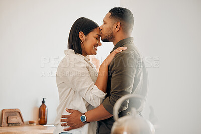 Buy stock photo Kissing, relaxed and romantic couple enjoying love, bonding and special moment together at home. Caring husband and wife in a loving relationship sharing quality time, showing affection and care