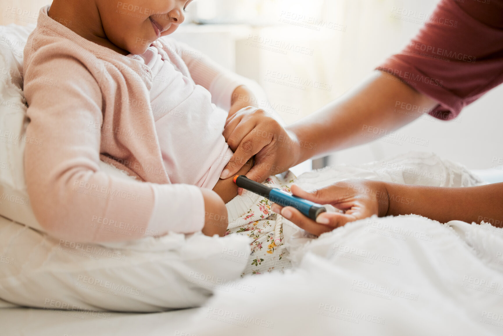 Buy stock photo Testing glucose, blood pressure and diabetes of little girl with insulin treatment in bed at home. Mother checking health, wellness and blood sugar medical measurement of her daughter in a bedroom 