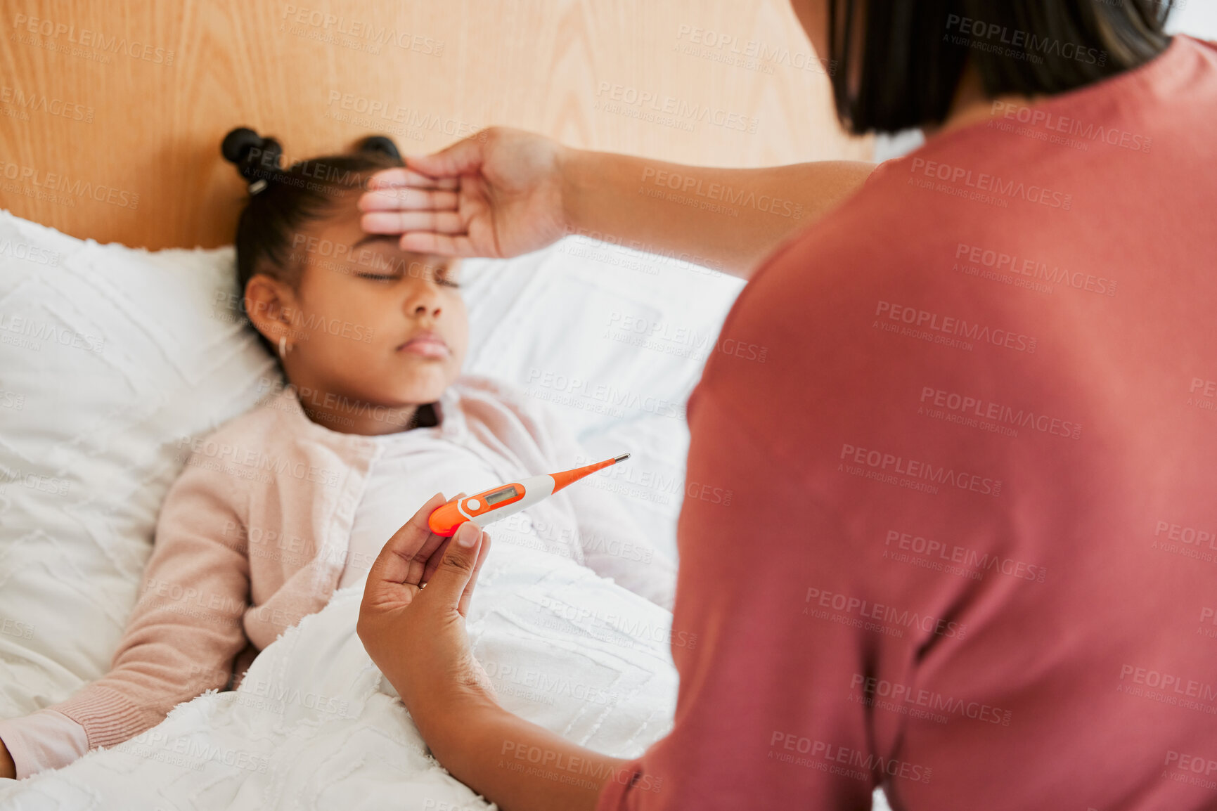 Buy stock photo Covid, care and sick little girl in bed with concerned mother checking temperature with a thermometer. Caring parent worried about her child with a fever, suffering from a cold, flu and covid fatigue