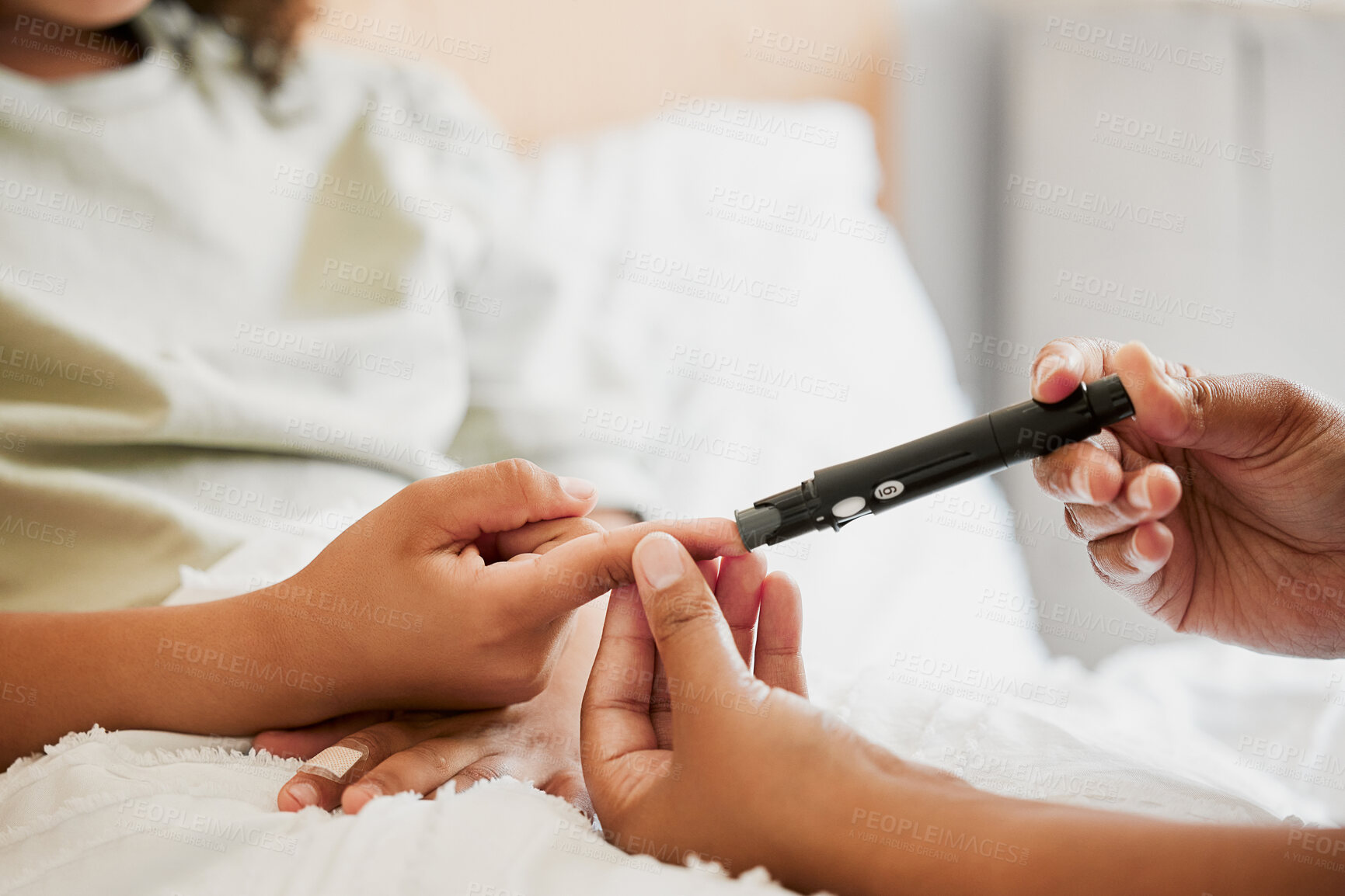 Buy stock photo Diabetes, diabetic and mother testing blood sugar levels of a child with a chronic disease at home. Closeup of mom measuring, checking and monitoring glucose in her kid in bed or in the bedroom