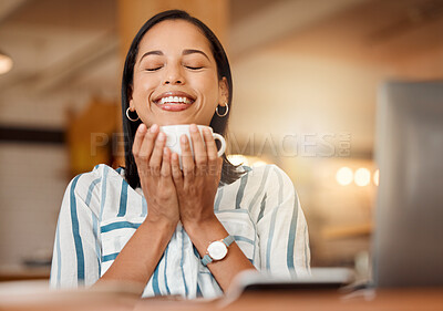 Buy stock photo Smiling, cheerful and casual young businesswoman enjoying a cup of coffee in a restaurant or cafe on her lunch break. Portrait of happy customer drinking her morning caffeine or tea beverage 