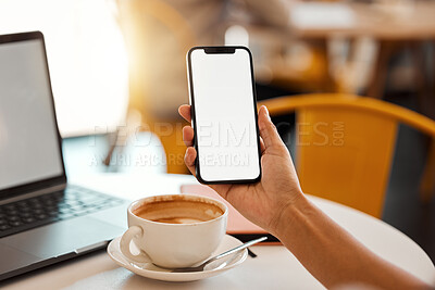 Buy stock photo Closeup of a female hand holding phone with copy space while sitting in a modern coffee shop. Woman working on technology browsing on the internet, social media or an online website at a cafeteria.