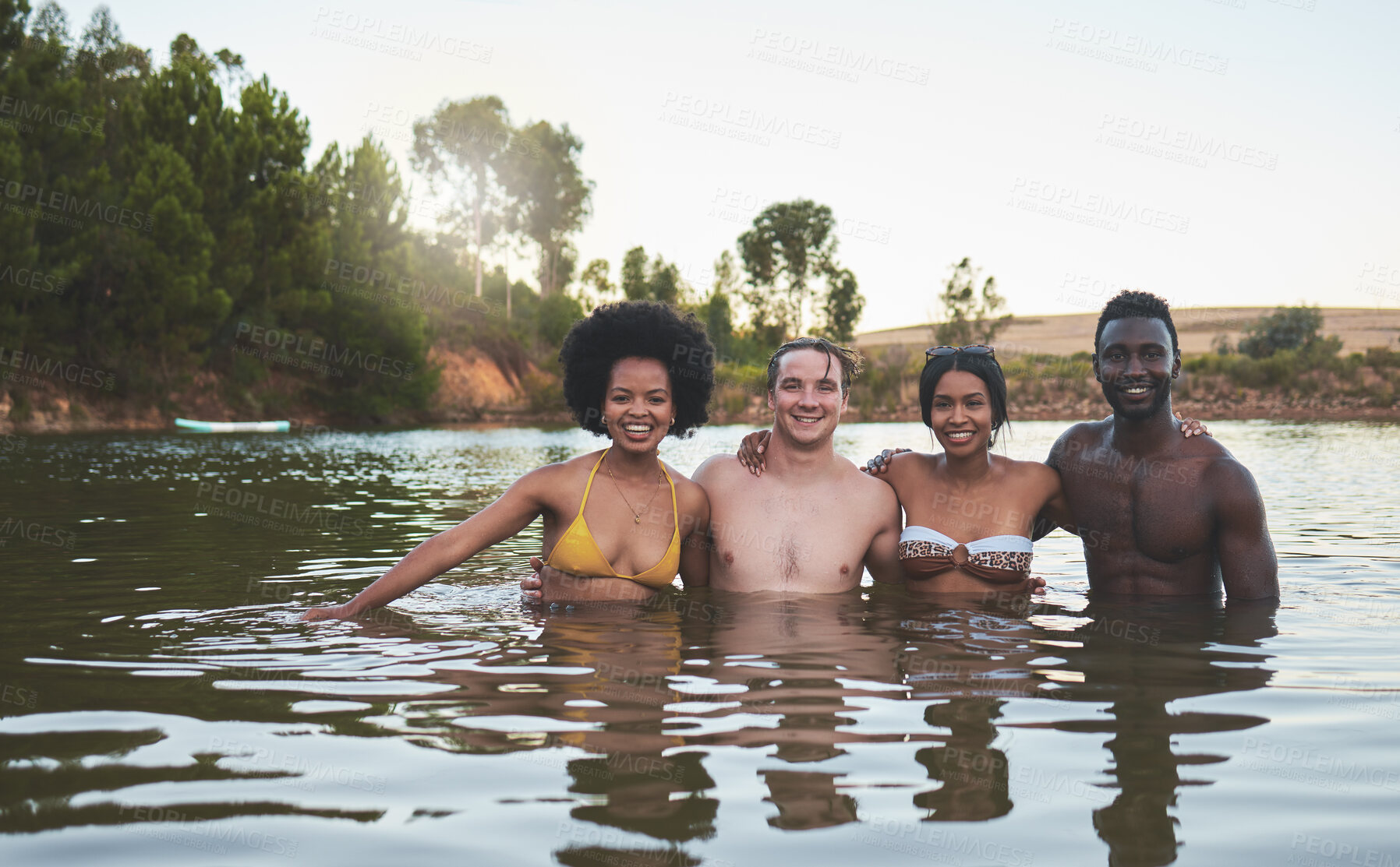 Buy stock photo Friends couples and lake swimming together in summer or spring in bikinis on a fun vacation. Happy, relaxed and diverse young people enjoy the freedom, river and dam outdoors on a nature vacation