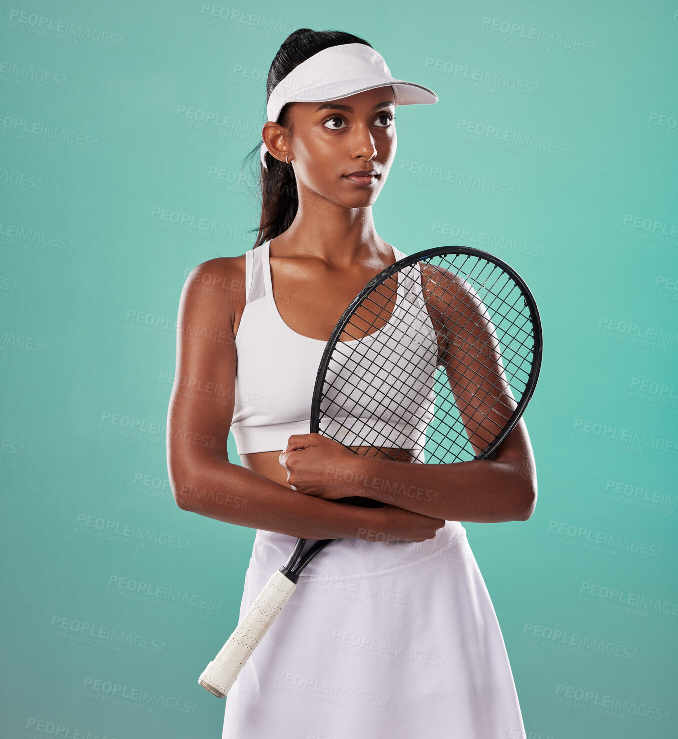 Buy stock photo Thinking tennis player, fitness athlete and active woman ready for training with racket in cool fashion and sports uniform while posing on green studio background. Healthy and serious young female