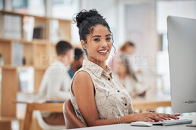 Buy stock photo Marketing agent with computer typing, browsing social media or searching online while excited about new job opportunity. Portrait of smiling or motivated creative working on startup website in office