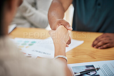 Buy stock photo Handshake, contract deal or negotiation closeup at desk at a meeting between professionals. Business greeting, thank you or welcome gesture to show respect with new partnership or onboarding.