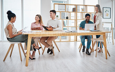 Buy stock photo Business people working in an office together, doing interview and talking in meeting at work. Group of professional colleagues, workers and employees in common area, hiring and planning with laptop