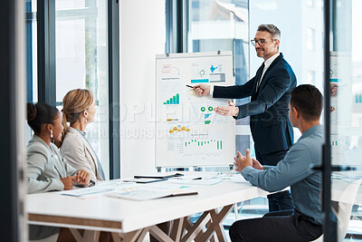 Buy stock photo Business presentation, strategy and meeting of a corporate man showing finance data to team. Accounting management office group collaboration while working and planning a financial marketing project 