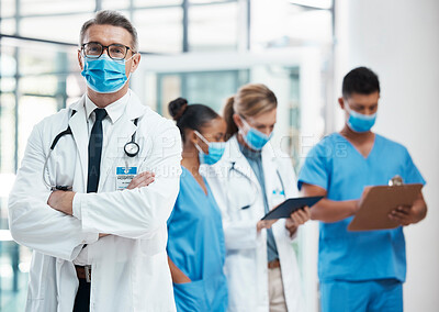 Buy stock photo Medical doctors, nursing and healthcare nurses standing with covid masks for their safety in a hospital. Successful, professional and trustworthy medic expert with a stethoscope in an emergency room