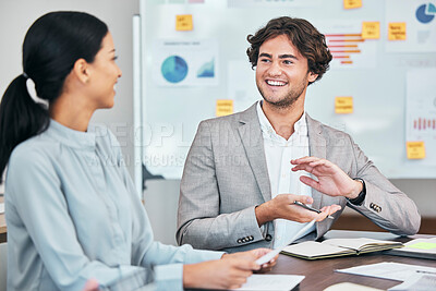 Buy stock photo Meeting, teamwork and planning with a young business man and female colleague talking during a boardroom meeting. Discussing the vision and mission for the growth and development of their company