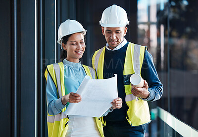 Buy stock photo Architect, construction engineers and builder partners with building blueprints planning together. Contractor colleagues in collaboration on development of engineering design plans for future project