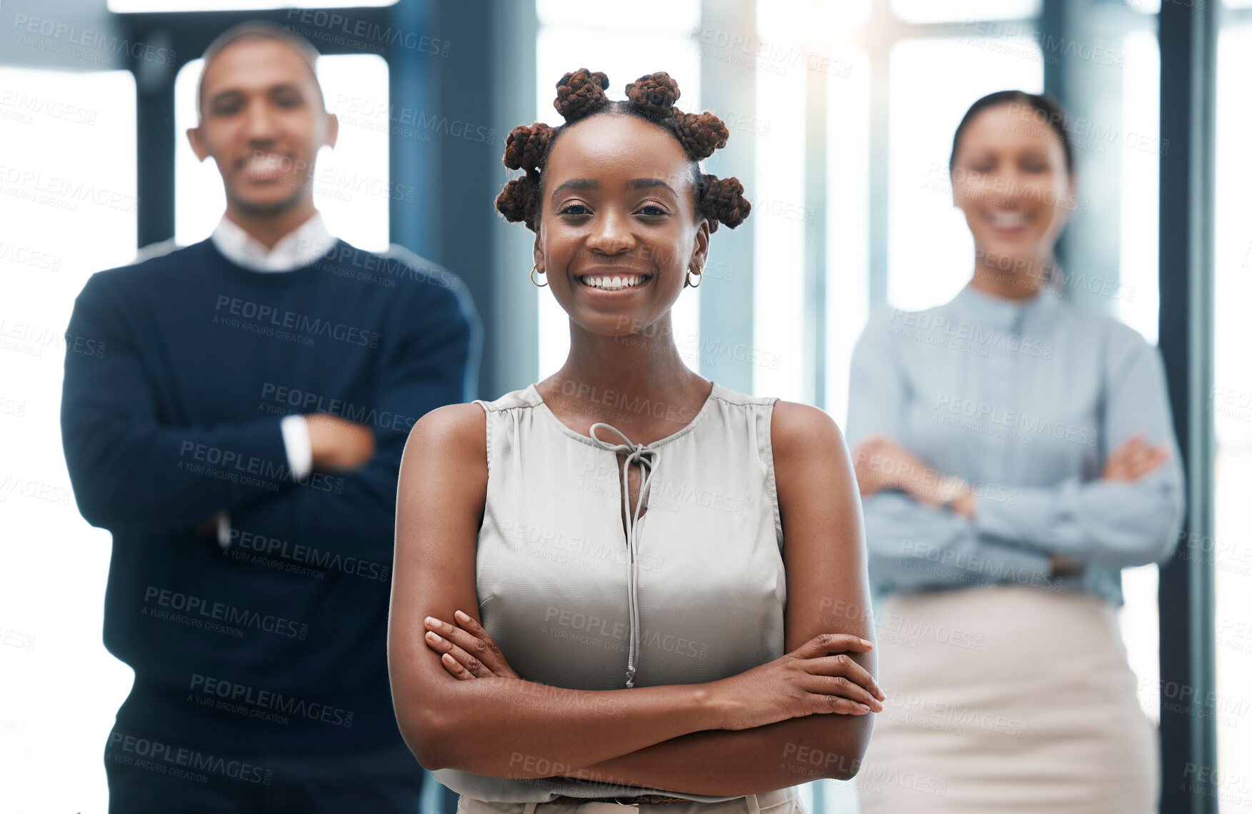 Buy stock photo Leadership, female empowerment and proud business woman standing with her team and smiling with her arms crossed. Portrait of happy young black leader with a positive vision and mindset
