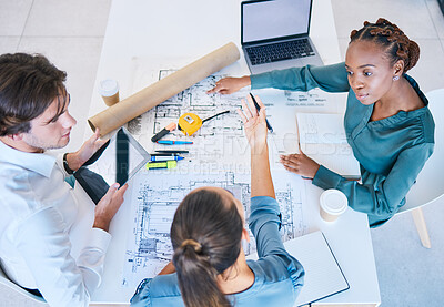 Buy stock photo Teamwork, planning and discussing architects working on new building, house or shopping mall design top view. A team, colleagues or workforce with blueprints, designs and plans for a company project