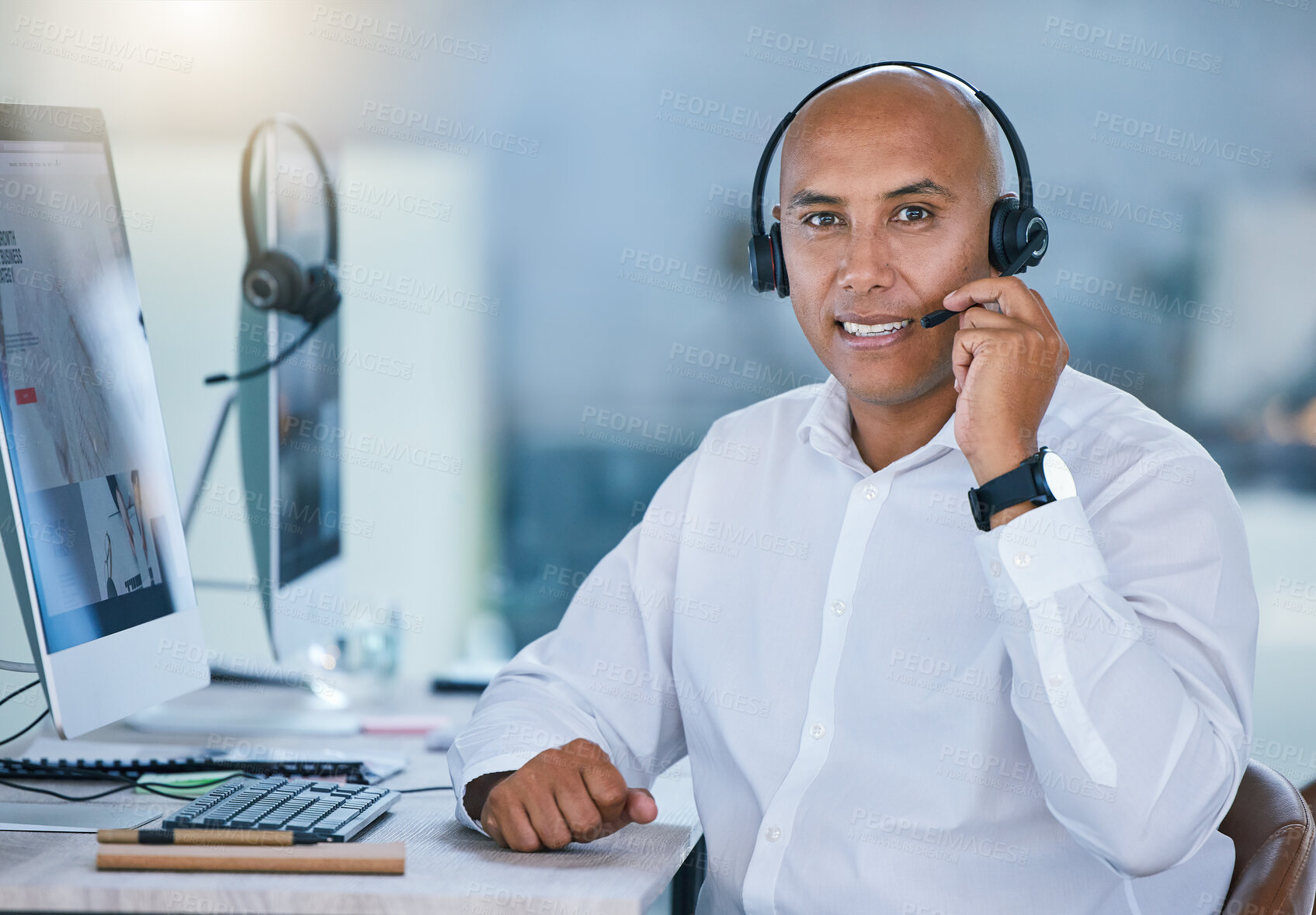 Buy stock photo Sales man, call center agent and customer service support operator giving friendly, help and expert communication while working in an office. Portrait of consultant, crm telemarketing and contact us