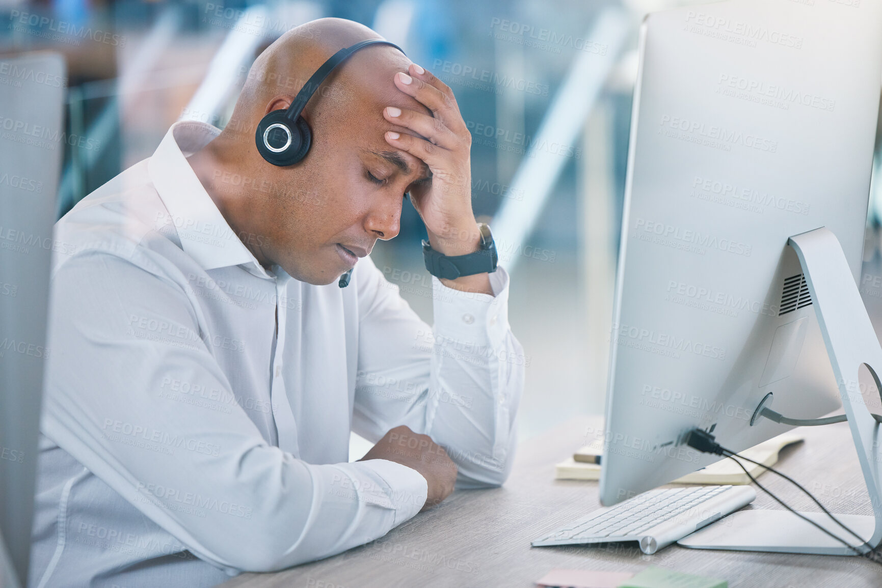 Buy stock photo Stressed, tired and headache of working sales consultant, call center agent or customer service advisor. Overworked, worried or frustrated phone operator employee at contact us helpdesk agency