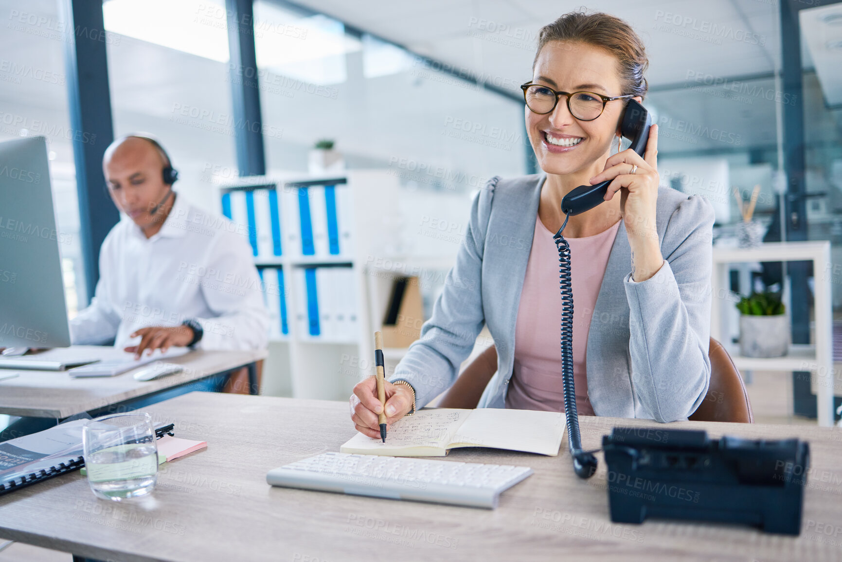Buy stock photo Smiling receptionist, business woman or customer service employee consulting on phone in telemarketing call center office. Happy corporate or crm support manager working in contact us helpdesk 