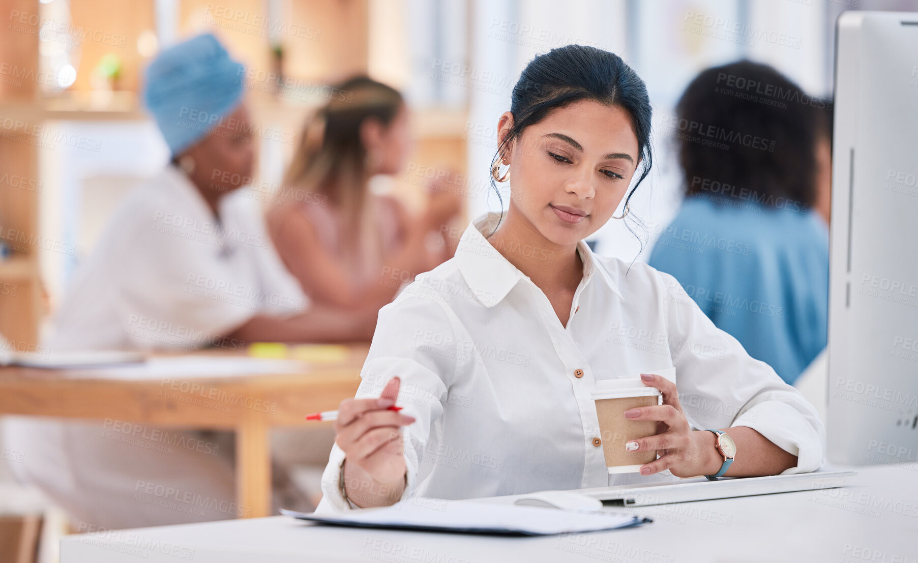 Buy stock photo Business intern writing notes, planning ideas and brainstorming while working on strategy in a startup agency. Organized young woman drinking coffee, developing goals and thinking of innovation