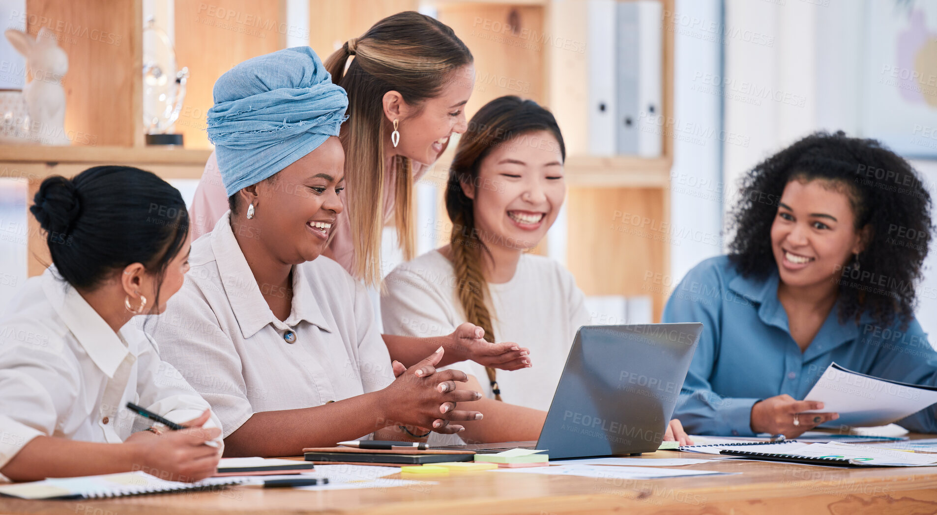 Buy stock photo Multicultural females only talking and planning business strategy and growth together in a meeting at the office. A happy marketing team of women collaborating on a project and working on a proposal