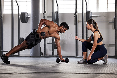 Buy stock photo Muscular, sports man with female gym instructor or fitness coach doing body building workout, push up plank exercise. Active male athlete weightlifting in wellness center with trainer for motivation.