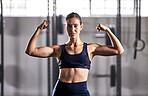 Gym woman flexing fitness, healthy and energy to show off her bicep muscles and strong abs in a sports studio. Training, exercise and workout motivation of a slim fit, body and muscular in a portrait