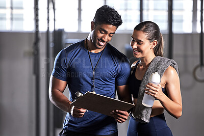 Buy stock photo Gym subscription, personal trainer and happy client talking and ready to fill in a membership form. Fitness coach discussing training, workout plan and progress in a health and wellness facility