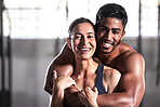 Muscular, strong and sensual couple with fit, healthy and sweaty arms from workout training in wellness gym. Hot, perfect and fit boyfriend and girlfriend hugging, embracing after endurance exercise