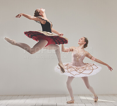 Buy stock photo Ballerina, ballet dancers and performance artists jumping in the air with flexibility, motion and balance in a studio. Energy, energetic and classical performers dancing together for fitness in hall