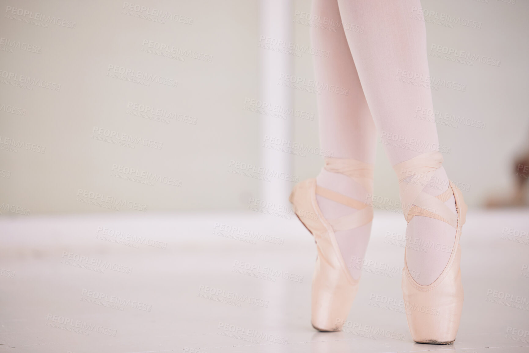 Buy stock photo Ballet feet, legs or tiptoe of an elegant dancer dancing in a dance studio practicing for a performance. Closeup of a skilled and talented ballerina training or performing in a class