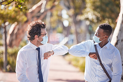 Buy stock photo Covid greet, social distancing and elbow bump by business men meeting and greeting outdoors. Happy, friendly and excited colleagues using covid19 prevention protocol and wearing masks