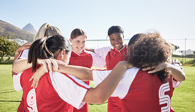 Buy stock photo Female soccer, football or team huddle for support, motivation or celebration circle on sports field. Diverse group of fitness, teamwork and happy girls, friends or athletes at training match or game