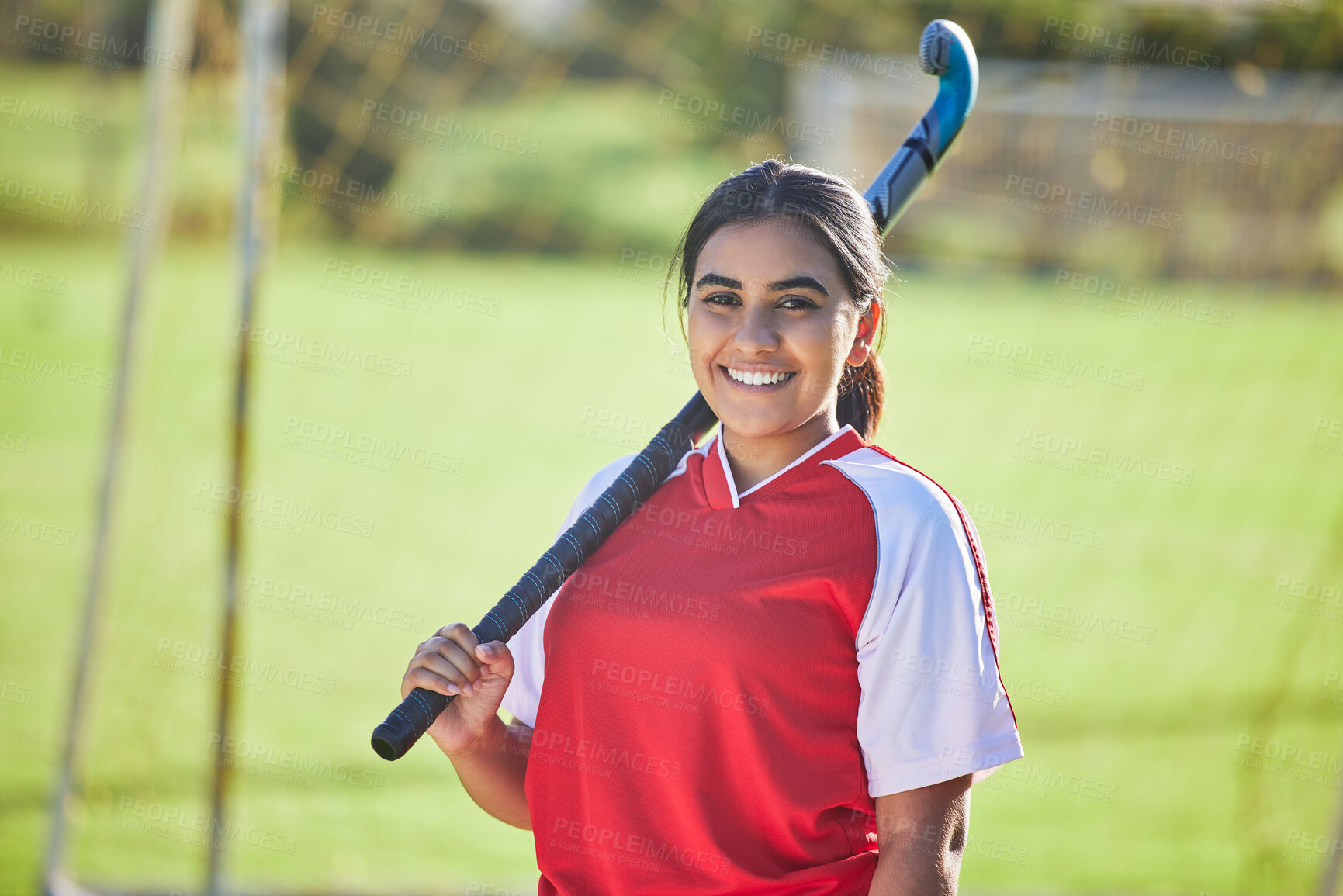 Buy stock photo Happy female hockey coach portrait, women's team sport player with natural field background outdoors alone. Confident athlete training for competition, motivation fitness and collaboration exercise.