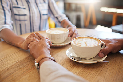 Buy stock photo Coffee, break and dating couple holding hands on a romantic date at a cafe, restaurant or coffee shop. Man, woman or people touching, in love and romance on anniversary or valentines day together