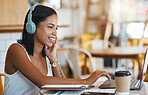 Happy student relaxing, studying or searching online videos on her laptop at a coffee shop with free internet. Young woman at a cafe store listening to music, radio or podcast news entertainment 