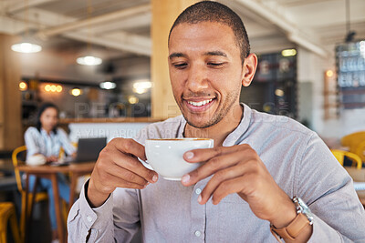 Buy stock photo Man enjoying a cup of coffee, while smiling and sitting at a cafe relaxing. Businessman drinking tea or caffeine at restaurant. Relaxed and happy male holding a mug or beverage in a coffee shop


