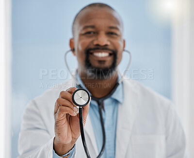 Buy stock photo Medical, healthcare worker and doctor with a stethoscope and smile ready for a patient. Hospital, health clinic or professional doctors office worker happy to help check heart health of patients