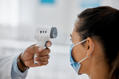 Buy stock photo Compliance, healthcare and covid with a doctor scanning a patient temperature with infrared thermometer, checking for a fever. Concerned woman suffering from corona, flu or cold in exam or consult