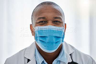 Buy stock photo Covid doctor wearing face mask for safety, protection and hygiene while working in a medical hospital or clinic. Portrait of trusted male physician, healthcare expert and frontline worker in pandemic