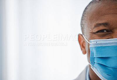 Buy stock photo Covid medical face mask by a healthcare professional with copy space to prevent the spread of covid19. The happy, smiling and half face of a male with protection from the coronavirus