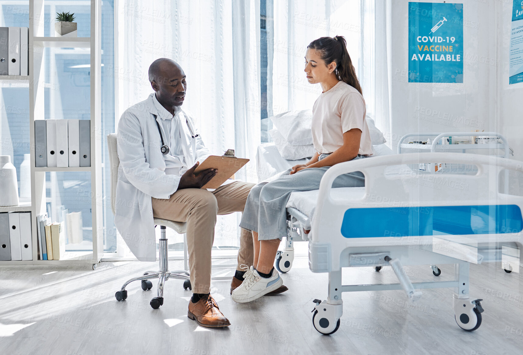 Buy stock photo Doctor, healthcare and man talking to girl patient about documents, medicine and health in a hospital. Medical worker consulting insurance and working to help woman at the clinic.