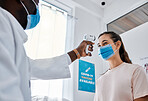 Covid, doctor and safety of healthcare professional scanning patient at the hospital or clinic at work. Medical worker or man using thermometer scanner on woman consulting for virus or infection.