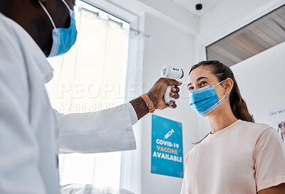 Buy stock photo Covid, doctor and safety of healthcare professional scanning patient at the hospital or clinic at work. Medical worker or man using thermometer scanner on woman consulting for virus or infection.