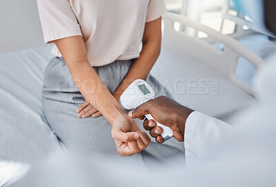 Buy stock photo Doctor check temperature of sick covid patient to test fever, risk of disease or flu. Healthcare worker hands scanning with laser thermometer for virus safety and clinic service in medical hospital