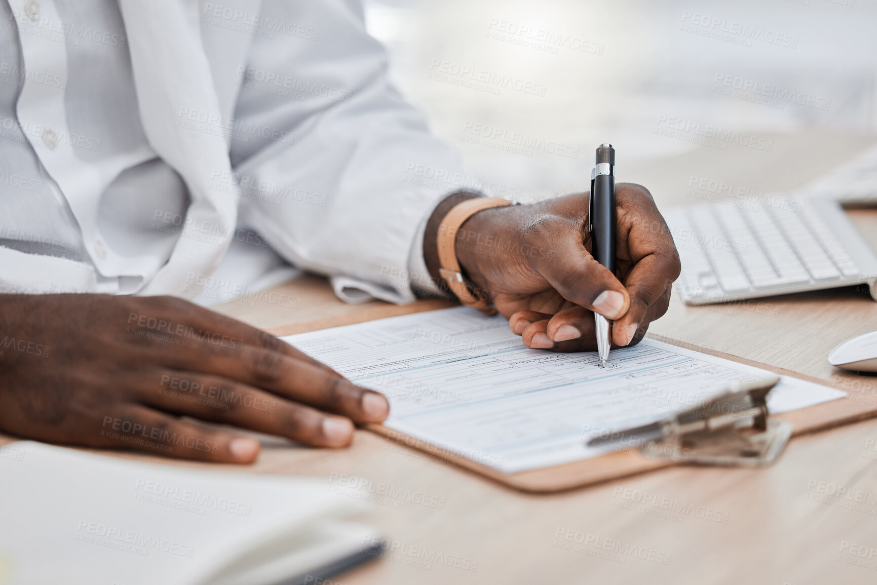 Buy stock photo Doctor writing a prescription or medical history, record or insurance in his office and working on a health document. Closeup of a healthcare black male professional or GP signing a contract