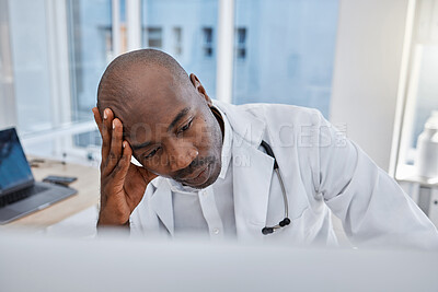 Buy stock photo Stress, anxiety and sad doctor at work on computer, sick and headache in a hospital or clinic. Medical professional or healthcare worker in depression, burnout and working and thinking about health.