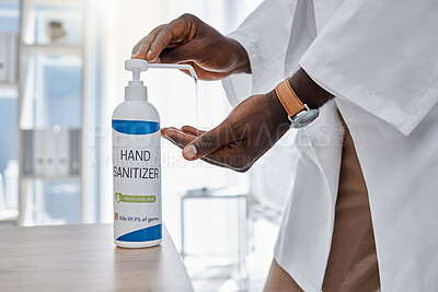 Buy stock photo Covid, hand sanitizer and hygiene by doctor, healthcare worker and medical professional in clinic, hospital and wellness center. Closeup of consulting man cleaning virus, bacteria and germs off hands